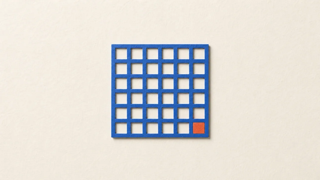 A blue paper grid with one orange cell